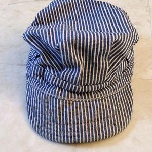 Conductor hat.